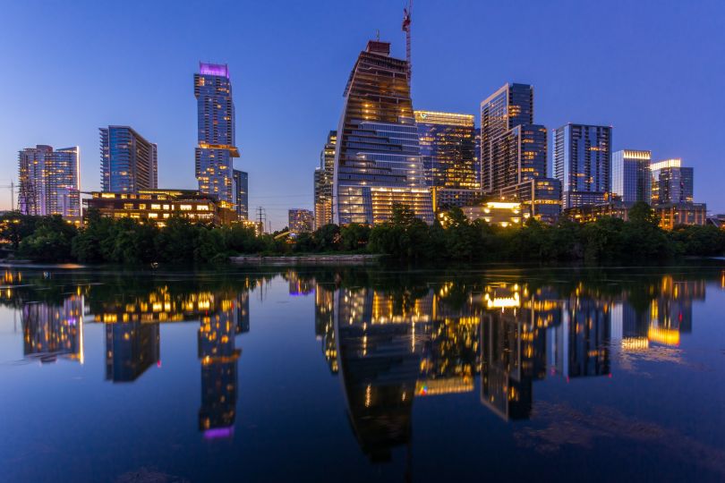 A nighttime photo of the Austin skyline.